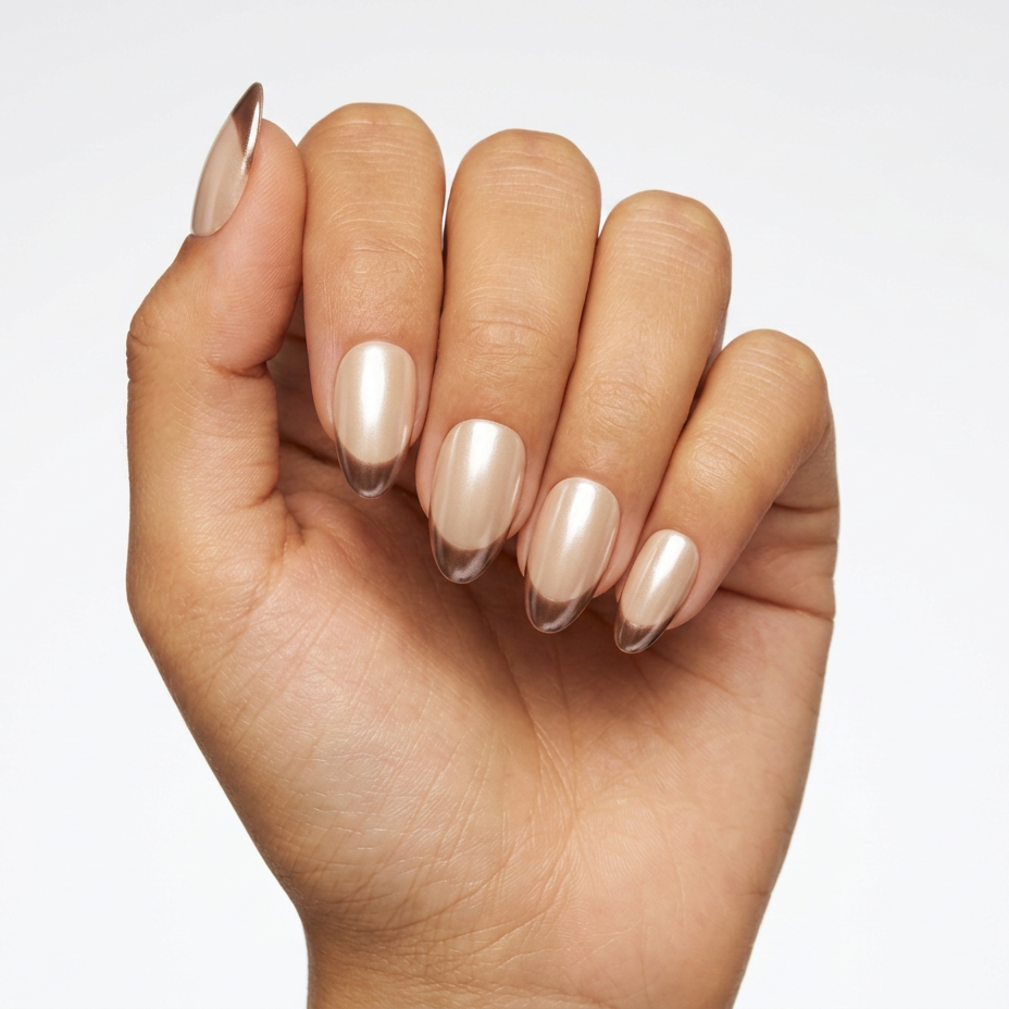 Hand with beige nail polish on a white background